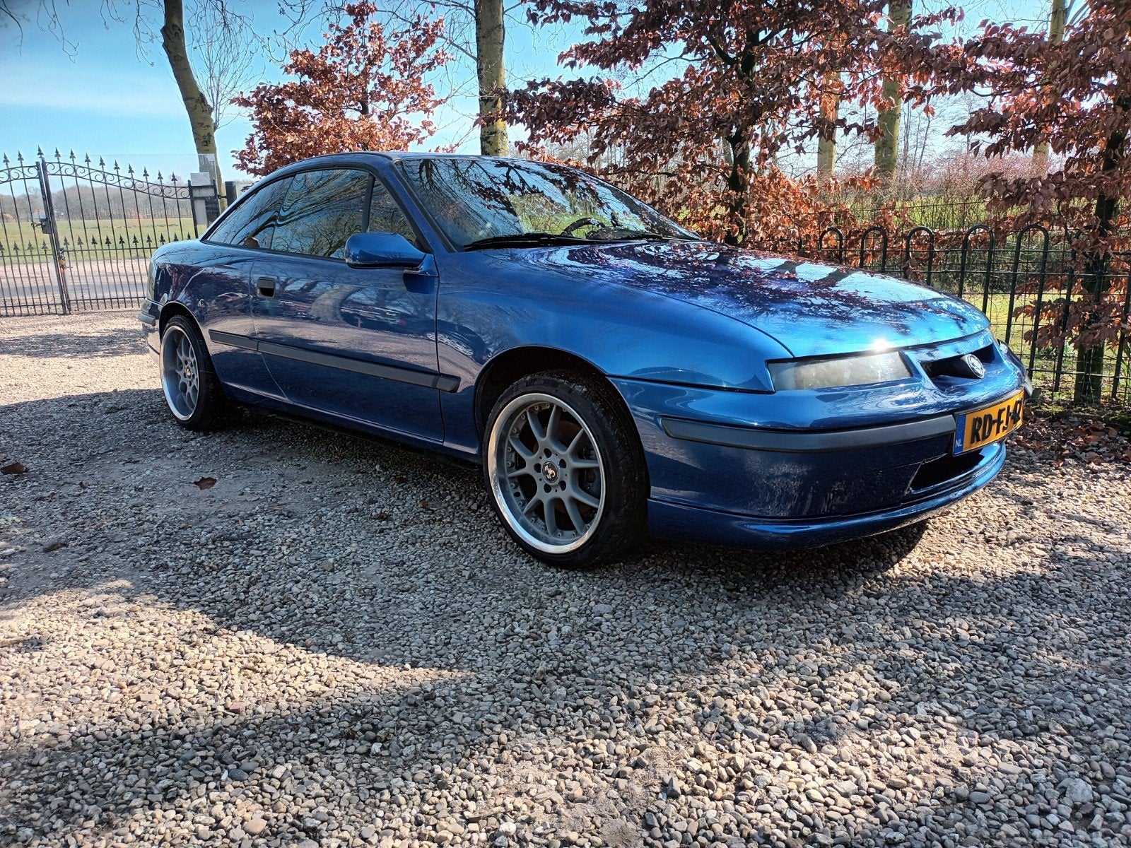Opel Calibra V6 3.2  211pk izgst NL auto, Auto's, Opel, Calibra, Zwart, Blauw, Leder