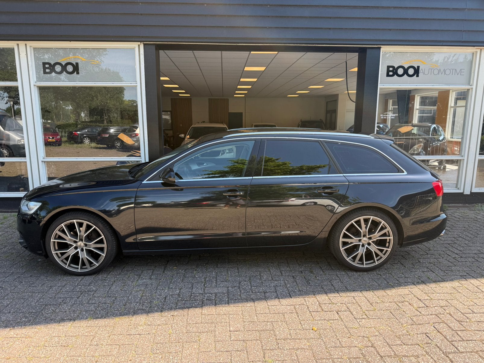 Audi A6 3.0 TDI 150KW Avant AUT Clima navi camera trekhaak, Stof, 1800 kg, Zwart, 197 €/maand