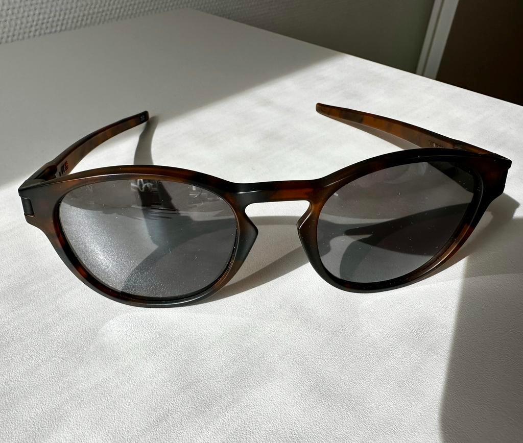 Oakley Latch Custom Prizm Polarized Zonnebril - juli 2025, Zonnebril, Bruin, Nieuw, Ophalen of Verzenden