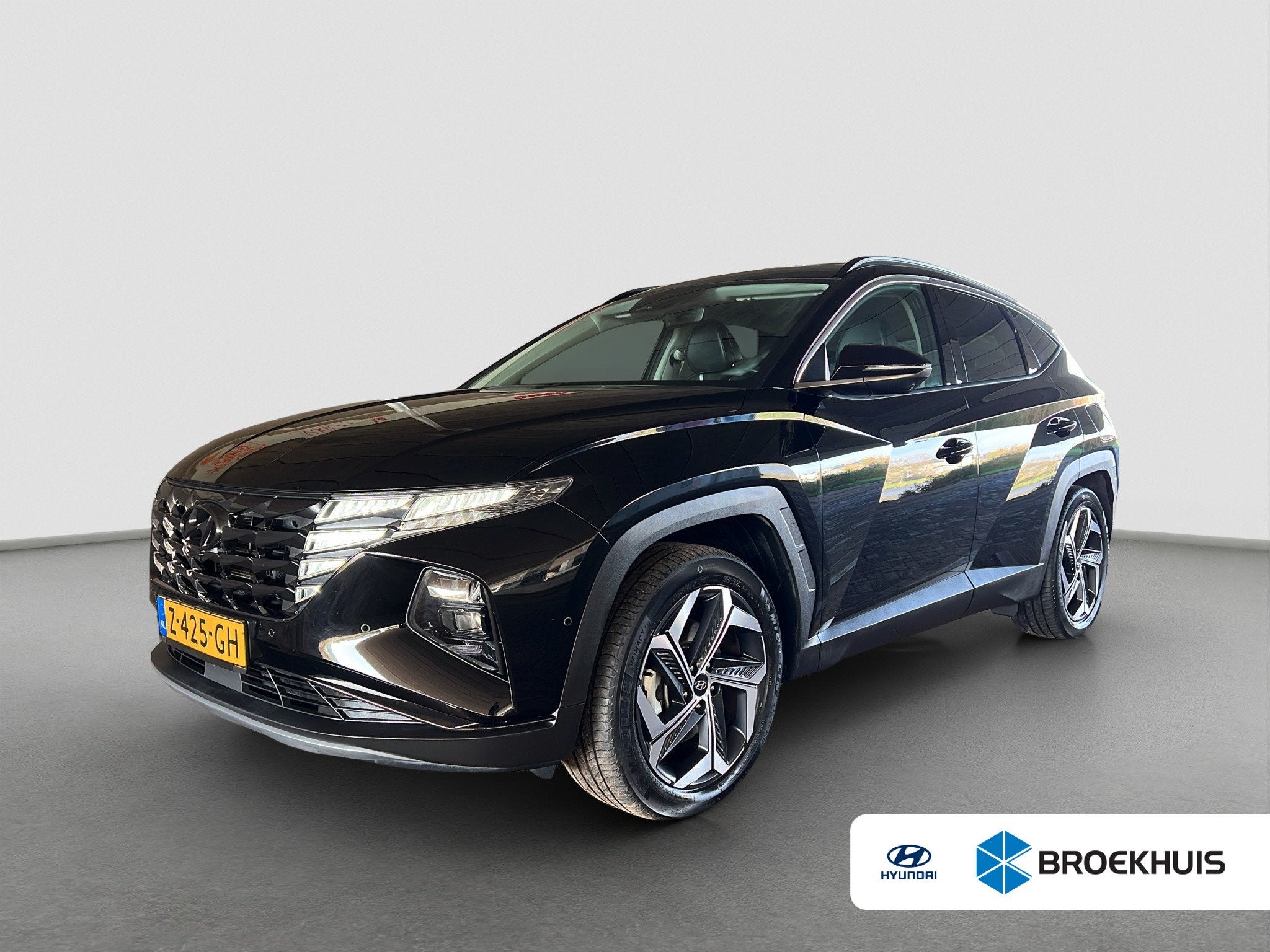 Hyundai Tucson 1.6 T-GDI 265pk PHEV Premium 4WD, Auto's, Hyundai, Gebruikt, 4 cilinders, Zwart, Bedrijf