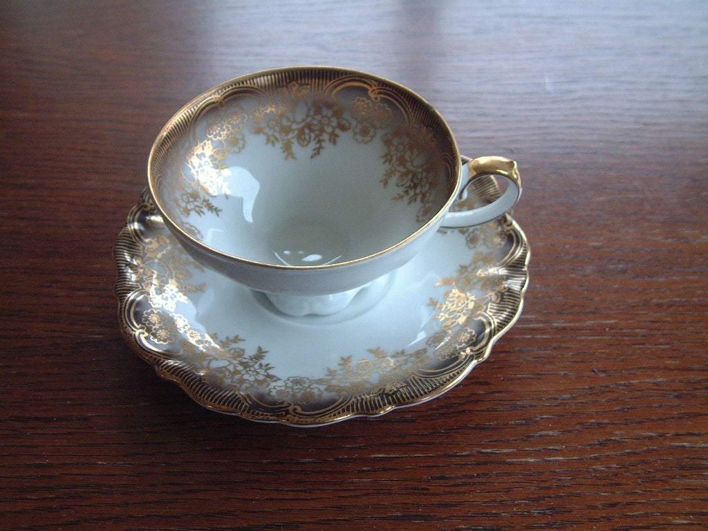oude jaren 50 thee kop en schotel merk gekroonde 2F nr. 1, Ophalen of Verzenden, Zo goed als nieuw, Porselein, Kop en/of schotel