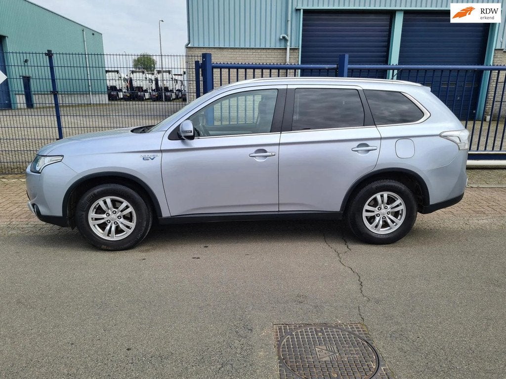 Mitsubishi Outlander 2.0 PHEV AWD Hybride*INCL. GARANTIE, Auto's, Mitsubishi, Zwart, 4 cilinders, Leder en Stof, Origineel Nederlands