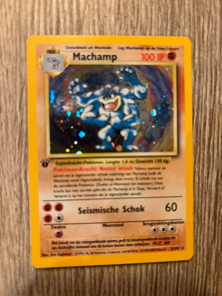 Machamp 8/102 Holo 1st Edition, Hobby en Vrije tijd, Ophalen, Zo goed als nieuw