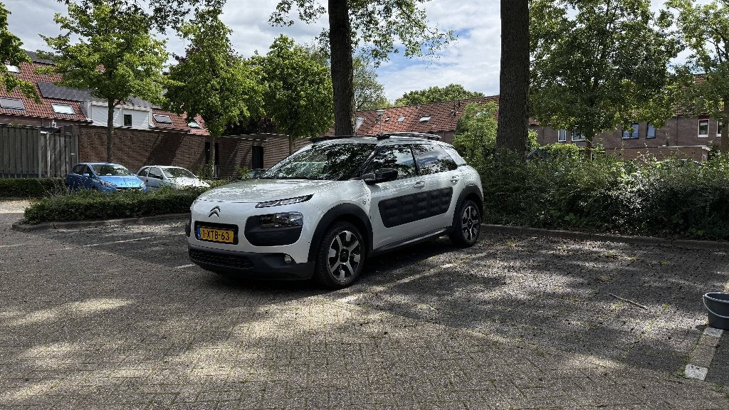 Citroën C4 Cactus 1.2 E-thp 110 2014 Wit, Auto's, Stof, 40 €/maand, 1199 cc, Multifunctioneel stuurwiel