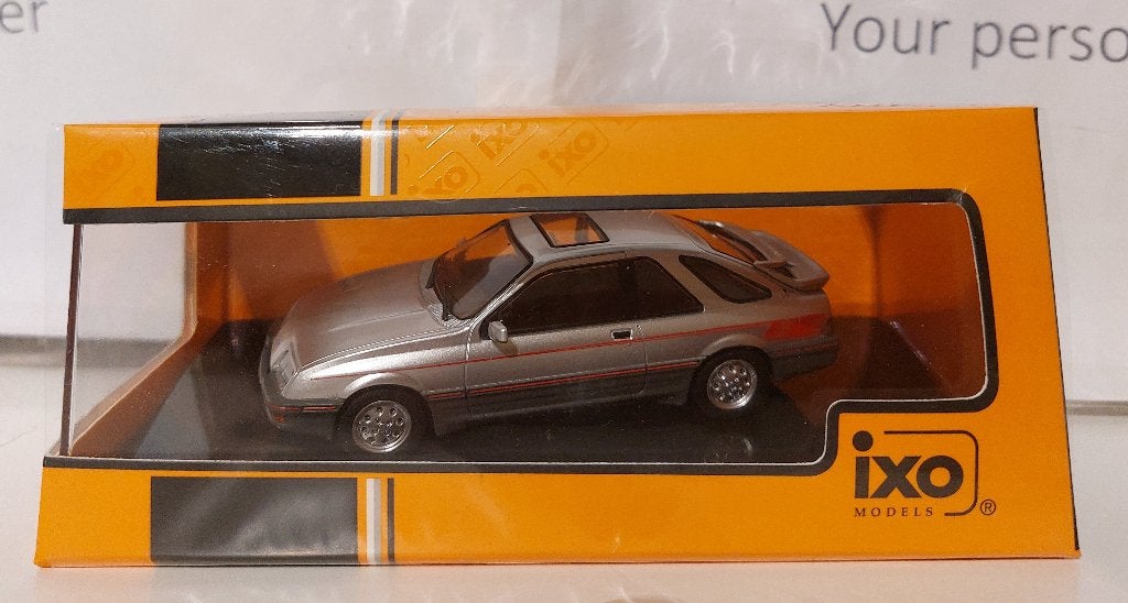 Ixo 1:43 Ford Sierra XR4i zilver 1984 nieuw in display, Ophalen of Verzenden, Nieuw, Auto, Overige merken