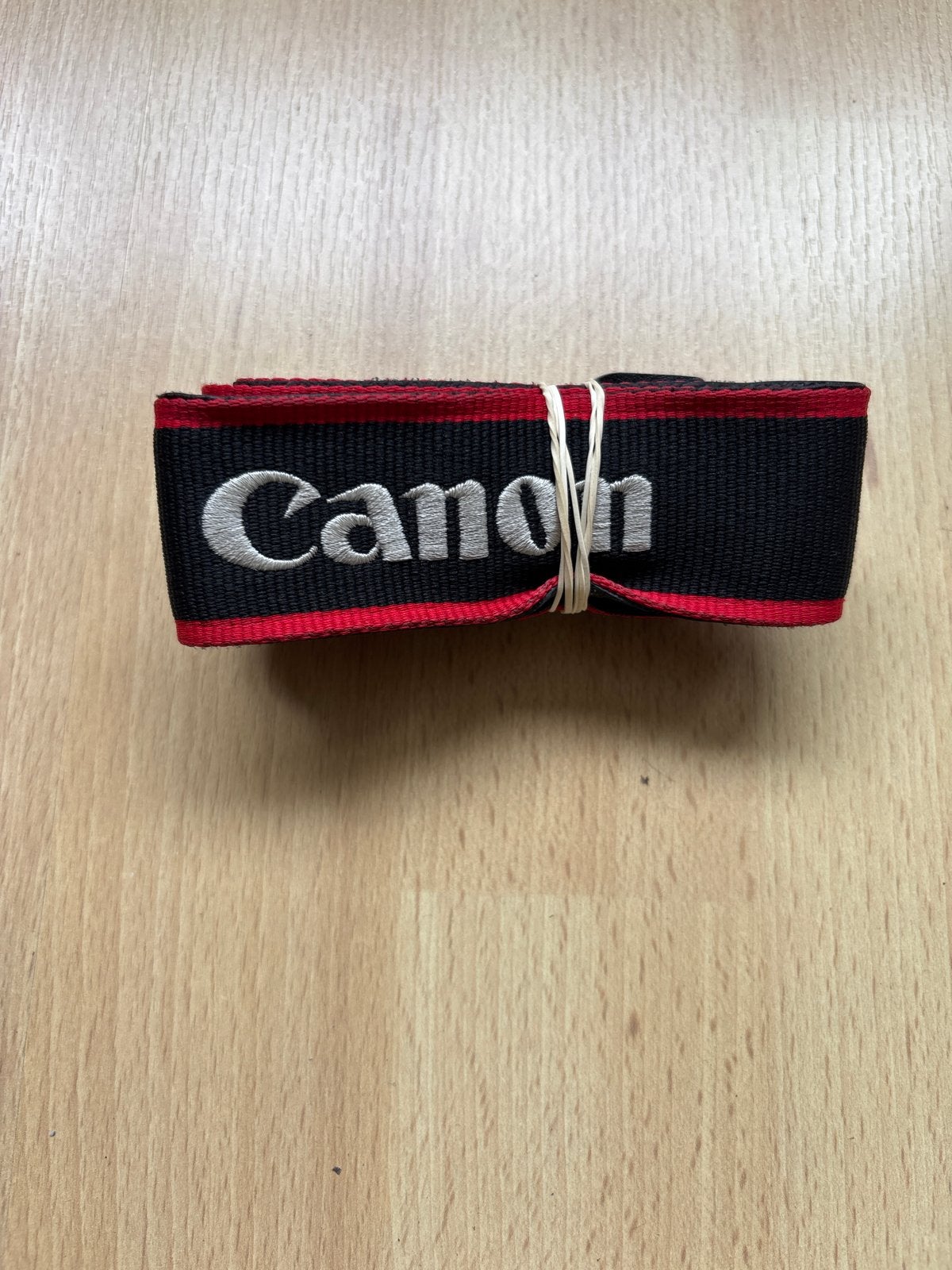 Ongebruikte Canon camerariem - Zwart/Rood, Audio, Tv en Foto, Fotografie | Professionele apparatuur, Canon, Overige typen, Ophalen of Verzenden