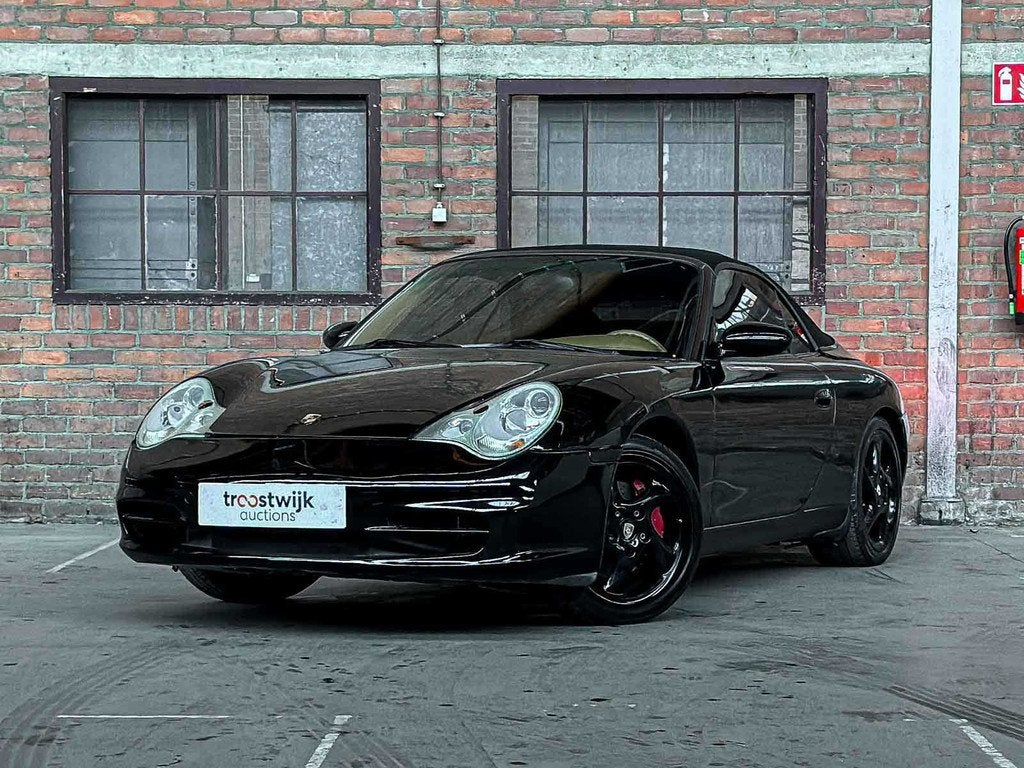 Porsche 911 Carrera 4 Cabriolet 3.6 996 320pk 2002 Youngtime, Auto's, Gebruikt, Cabriolet, Bedrijf, Handgeschakeld