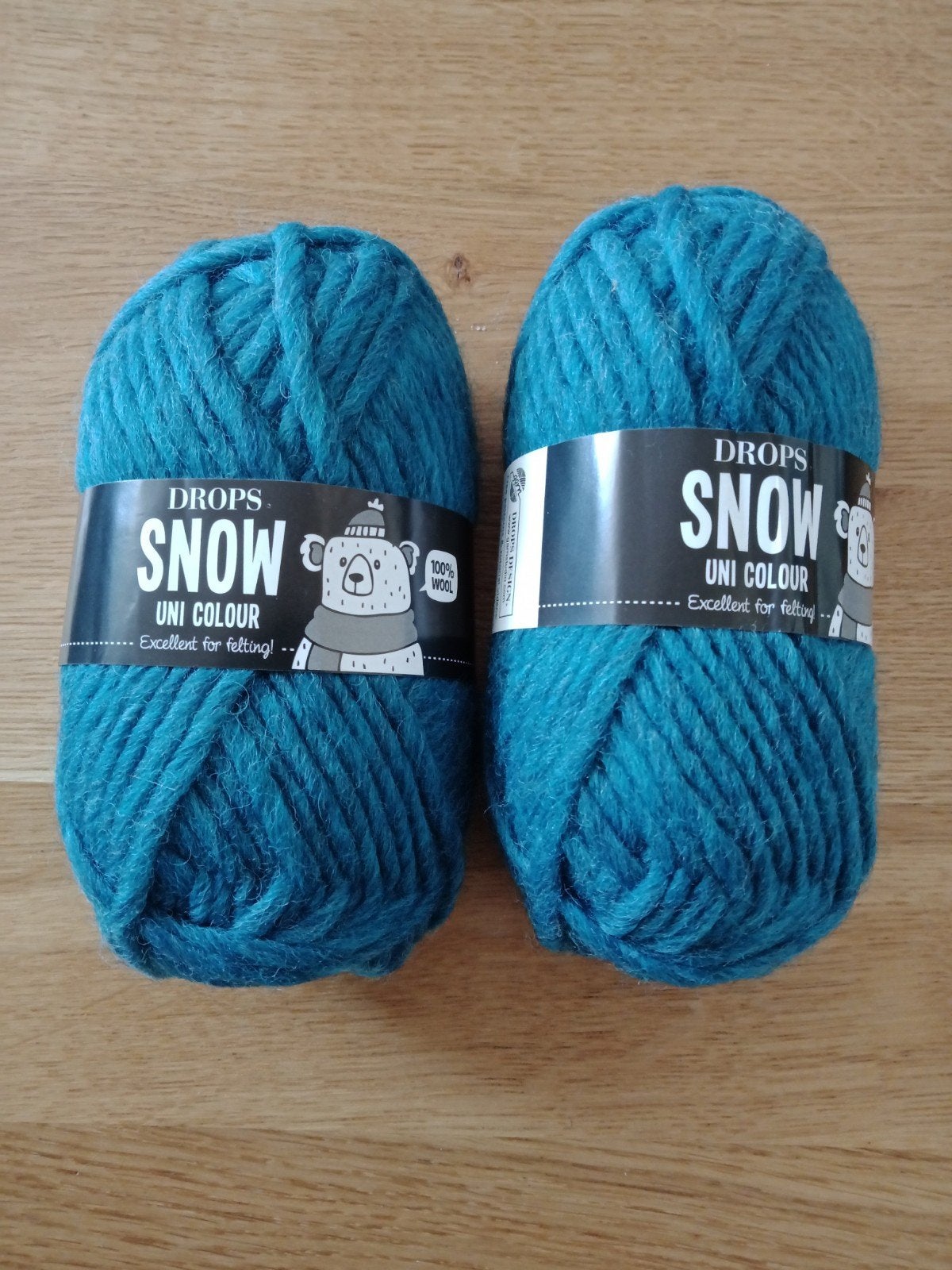 2 bollen Drops Snow Uni Colour wol - 05 turkoois, Ophalen of Verzenden, Nieuw, Breien of Haken, Wol of Garen
