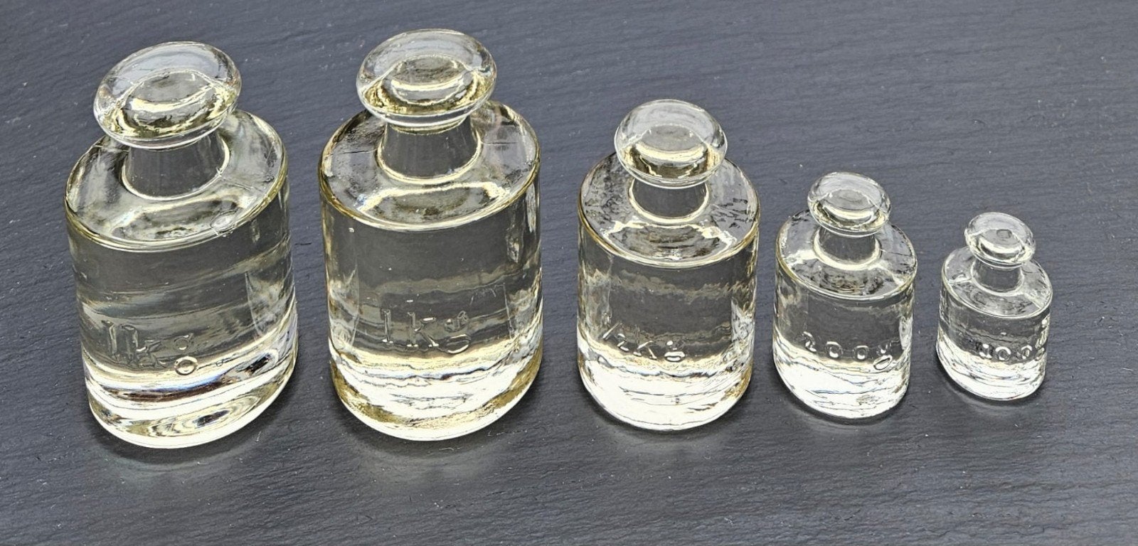 5 glazen gewichten, Antiek en Kunst, Antiek | Glas en Kristal, Ophalen of Verzenden