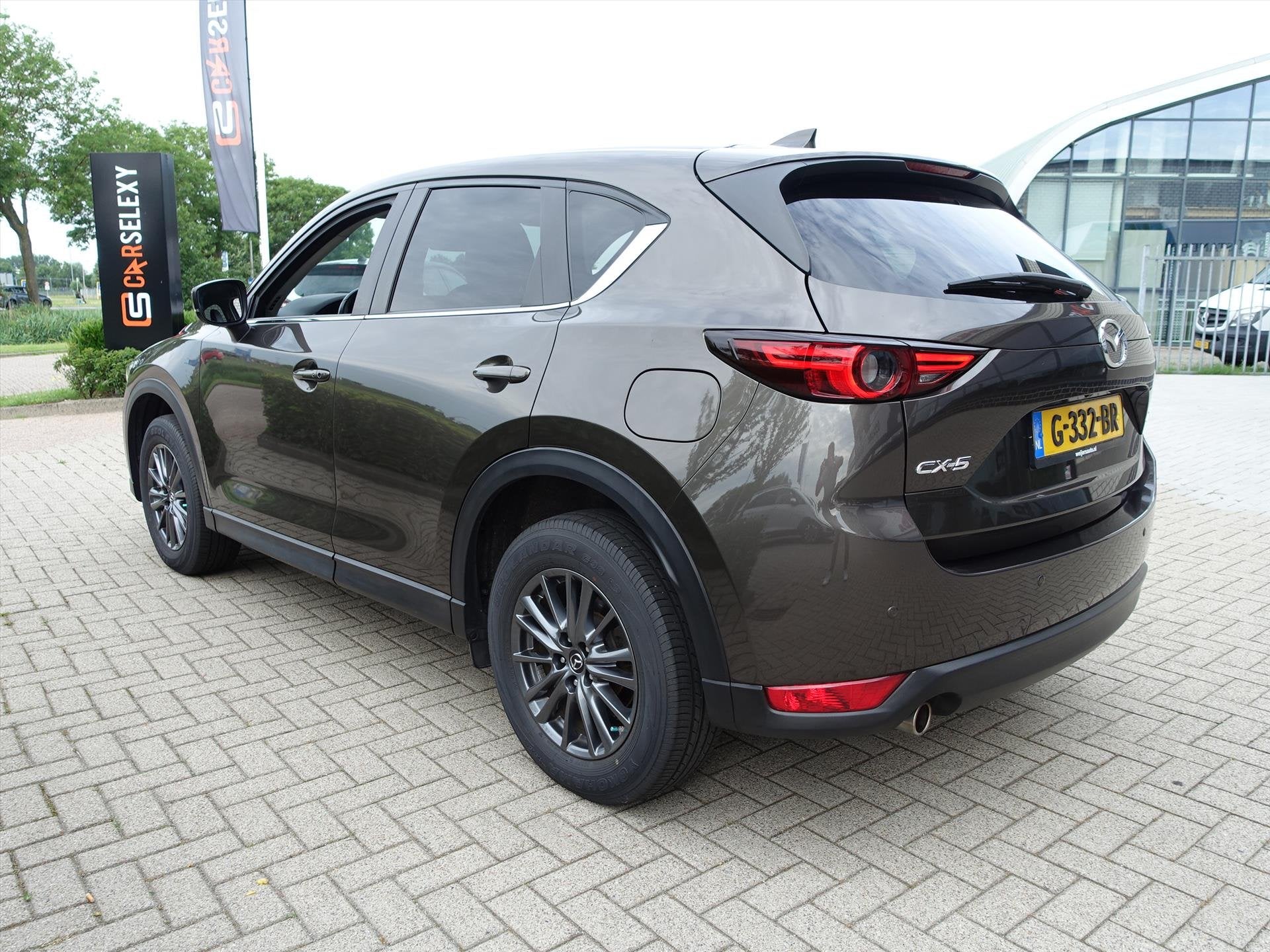MAZDA Cx-5 2.0 SKYACTIV-G 165pk Automaat Business Comfort Af, Auto's, 1998 cc, Gebruikt, 4 cilinders, 2000 kg