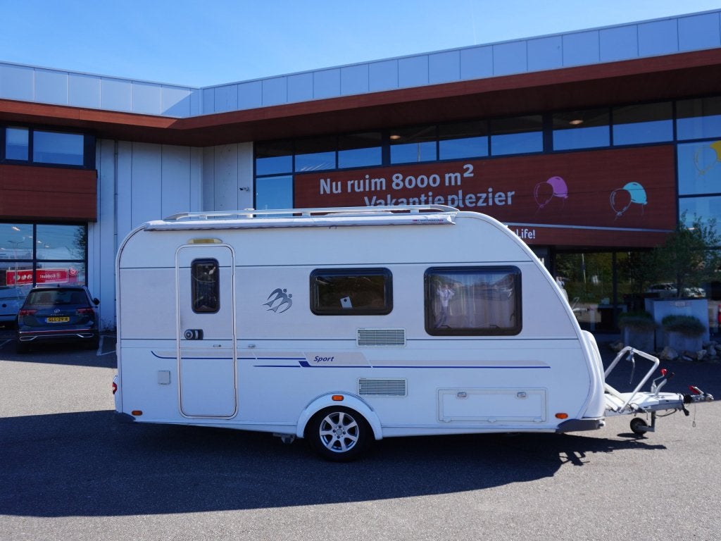 Knaus Sport Special 420 QD MET VOORTENT EN ZAKLUIFEL, Caravans en Kamperen, Caravans, Schokbreker, Treinzit, Knaus, Tot en met 4