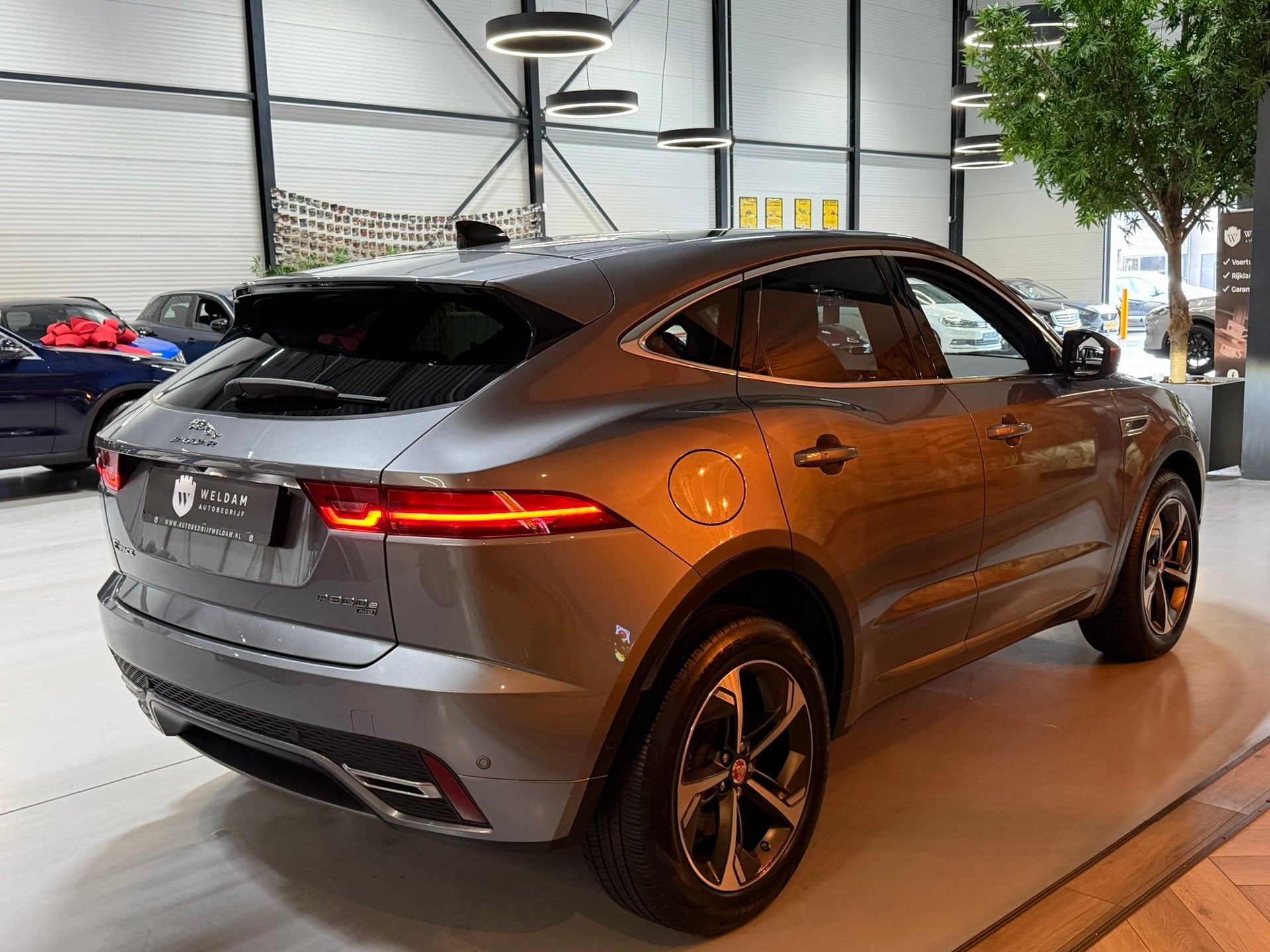 Jaguar E-PACE 1.5 P300e AWD R-Dynamic SE AWD 309PK 93%SOH Ga, Auto's, Automaat, Met garantie (alle), Leder, Bedrijf