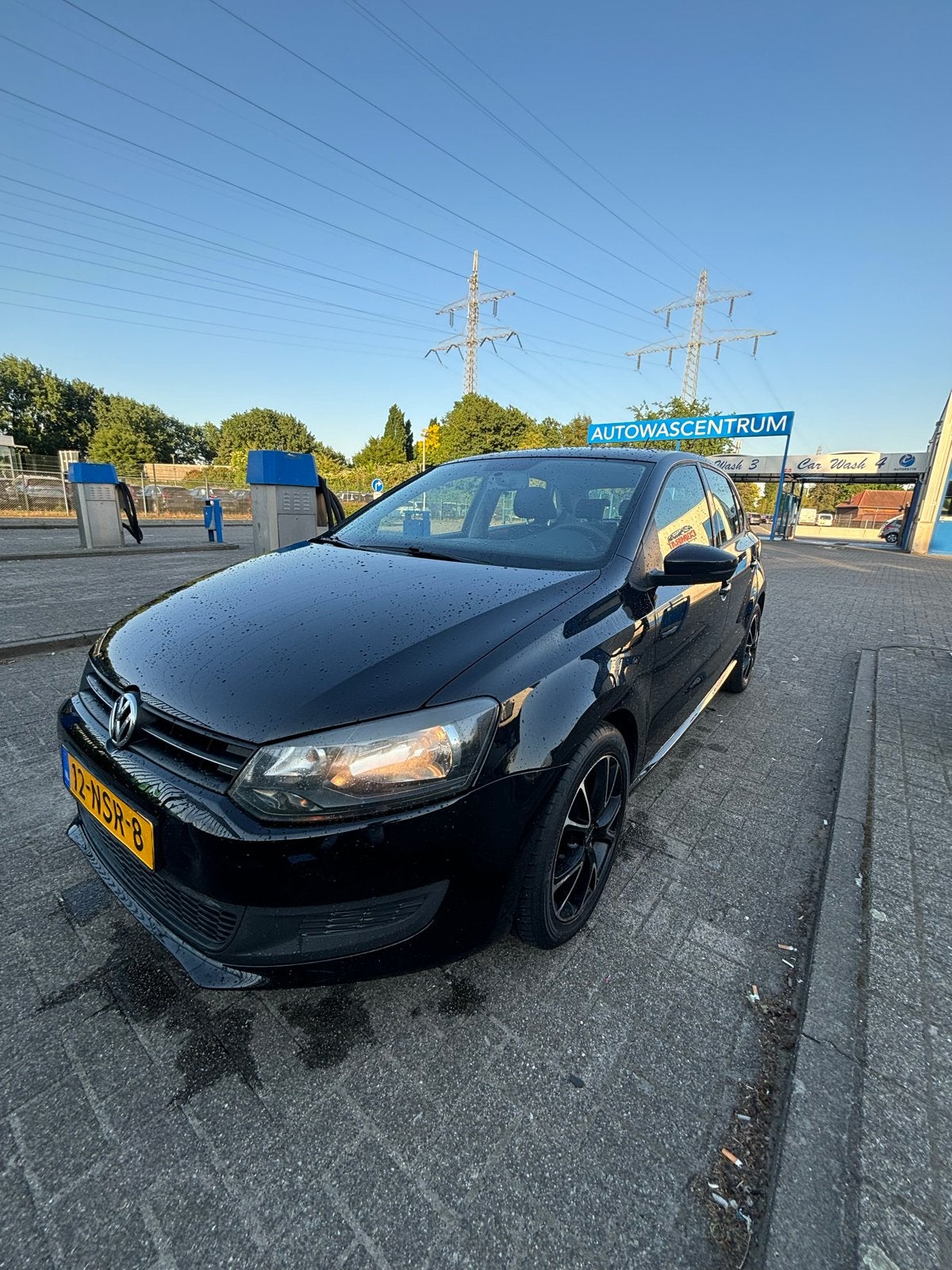 Volkswagen Polo 1.4 16V FSI 63KW 2010 Zwart, Auto's, Voorwielaandrijving, 970 kg, 40 €/maand, 4 cilinders