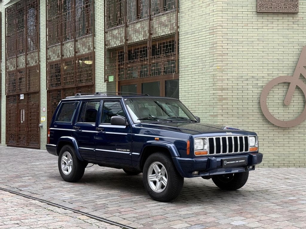 Jeep Cherokee 4.0i 60th Anniversary 159950km excellent, Auto's, Automaat, 450 kg, Gebruikt, Zwart