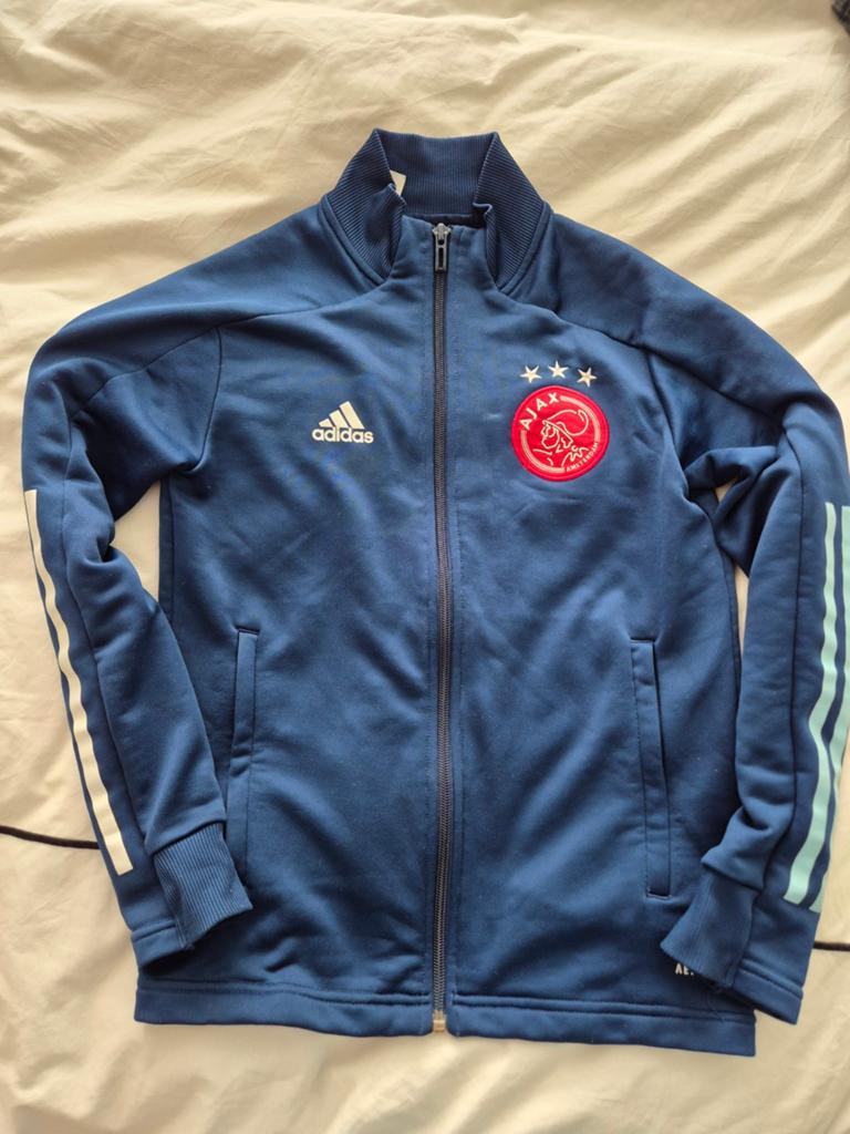 Trainingsjasje maat 140, Ophalen of Verzenden, Zo goed als nieuw, Overige maten, Blauw