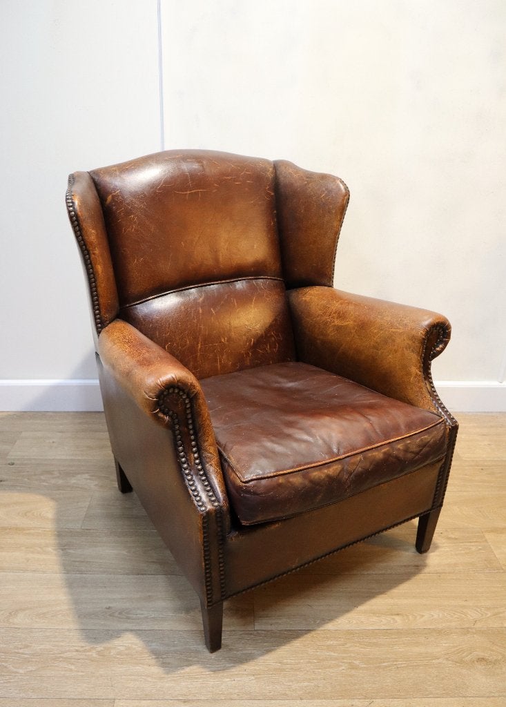 Lederen oorfauteuil, clubfauteuil, Antiek en Kunst, Ophalen of Verzenden