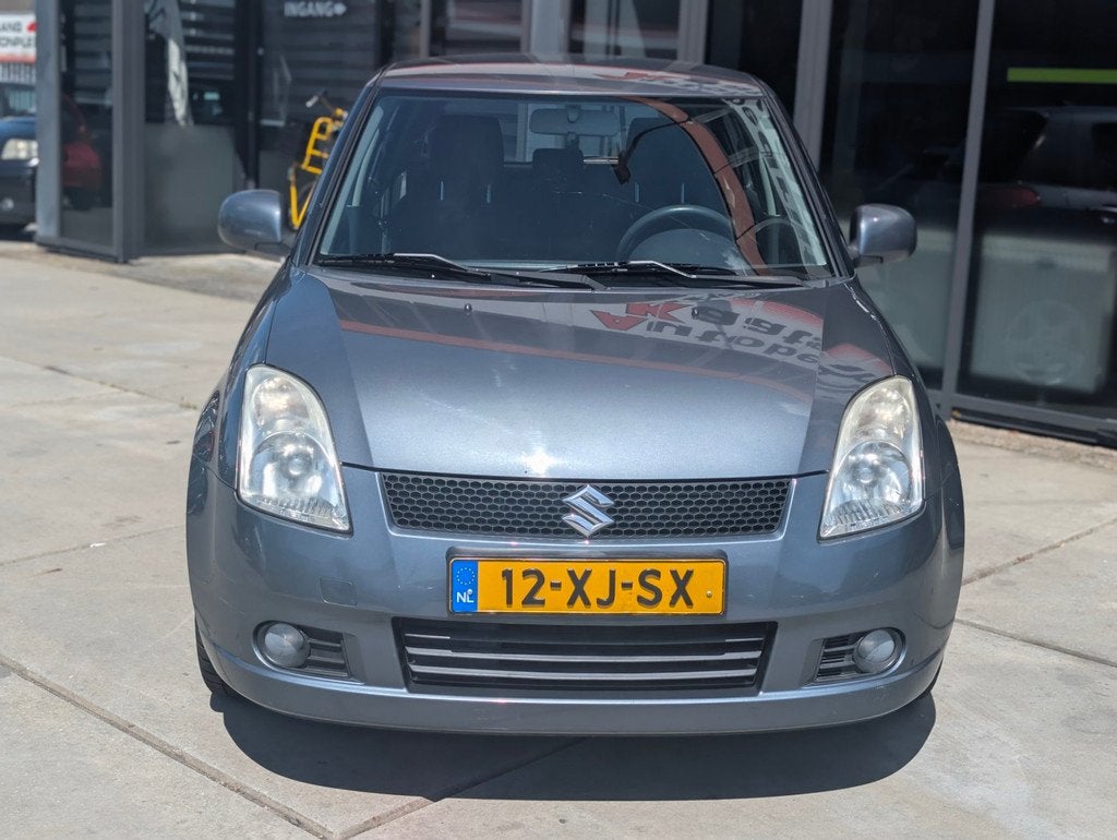 Suzuki Swift 1.3 Shogun - Airco - Electr Ramen -, Auto's, Voorwielaandrijving, Stof, Zwart, 965 kg