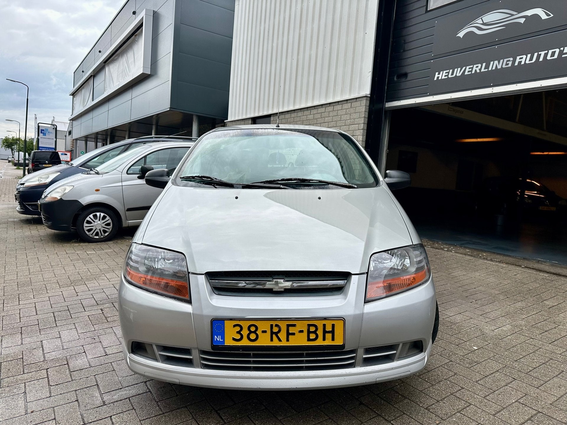 Chevrolet Kalos 1.4 Spirit | Airco | D-Riem VV | PDC, Stof, Zwart, 4 cilinders, Metallic lak