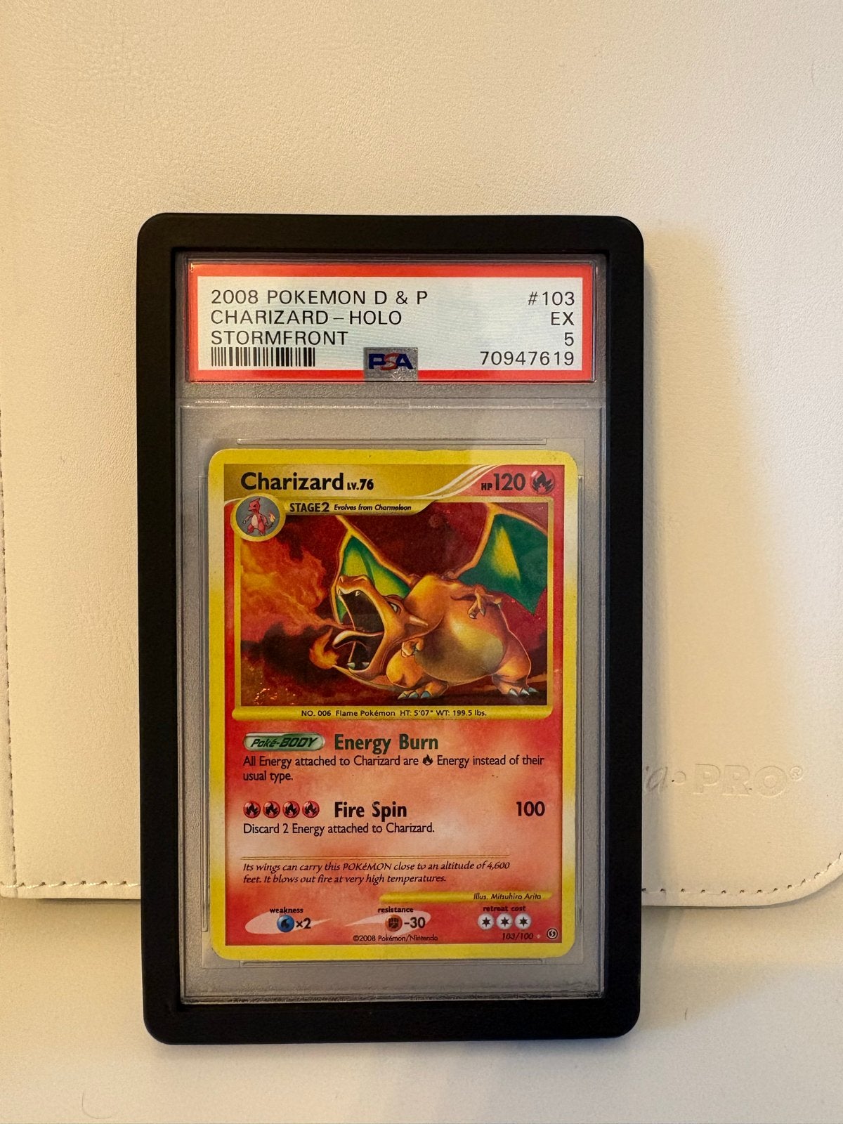 Charizard LV.76 PSA 5 - 2008 Pokémon D&P Stormfront, Ophalen of Verzenden, Gebruikt, Losse kaart
