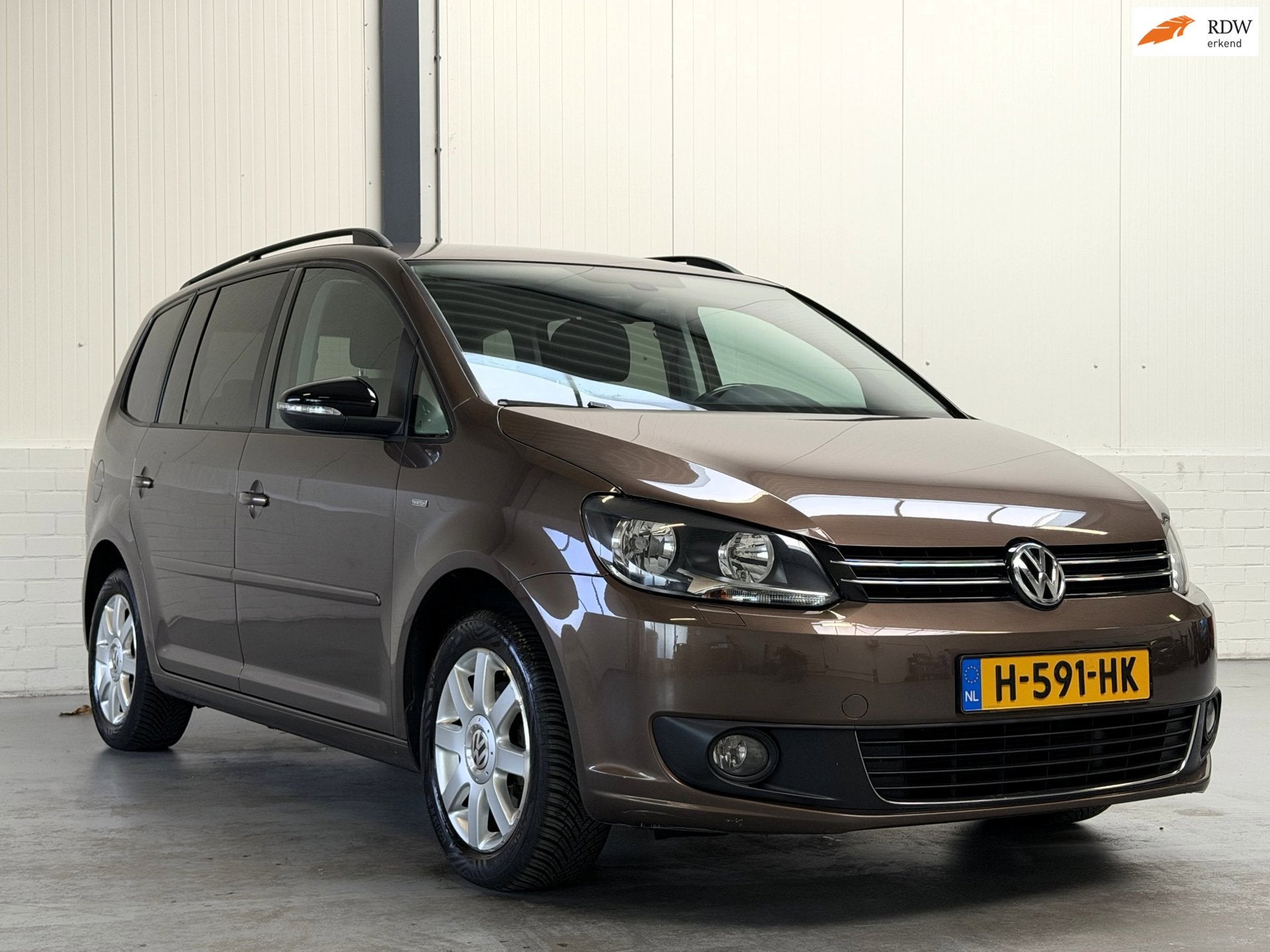 Volkswagen Touran 1.2 TSI Highline BlueMotion 7p., Voorwielaandrijving, Euro 5, Automatische klimaatregeling, Gebruikt