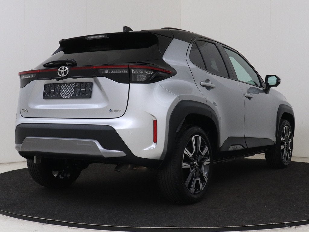 Toyota Yaris Cross 1.5 Hybrid 130 Launch Edition | JBL | Pan, Auto's, Toyota, 12 maanden, 1195 kg, Gebruikt, Leder en Stof