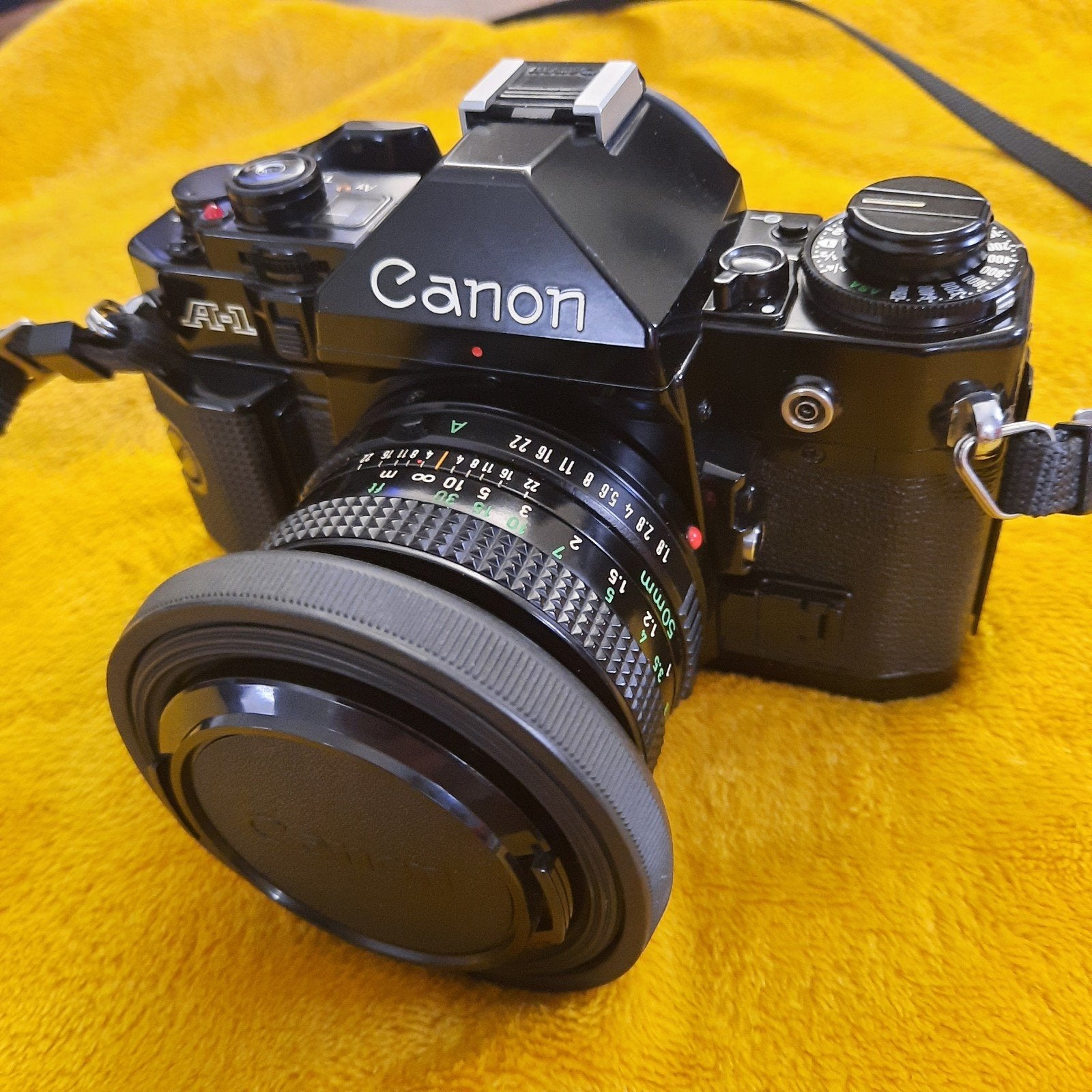 Canon A1 spiegelreflexcamera met 50mm lens . z.g.a.n., Audio, Tv en Foto, Fotocamera's Analoog, Ophalen, Zo goed als nieuw, Spiegelreflex