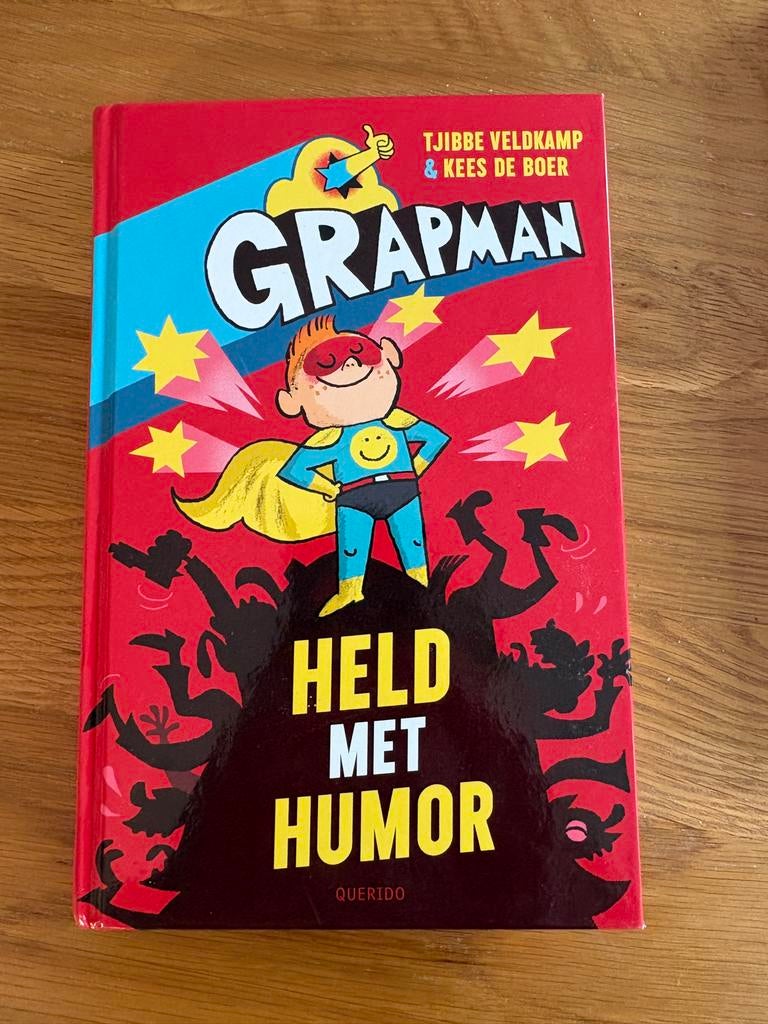 Grapman: Held met Humor! Lees en Lach!, Boeken, Ophalen of Verzenden, Zo goed als nieuw