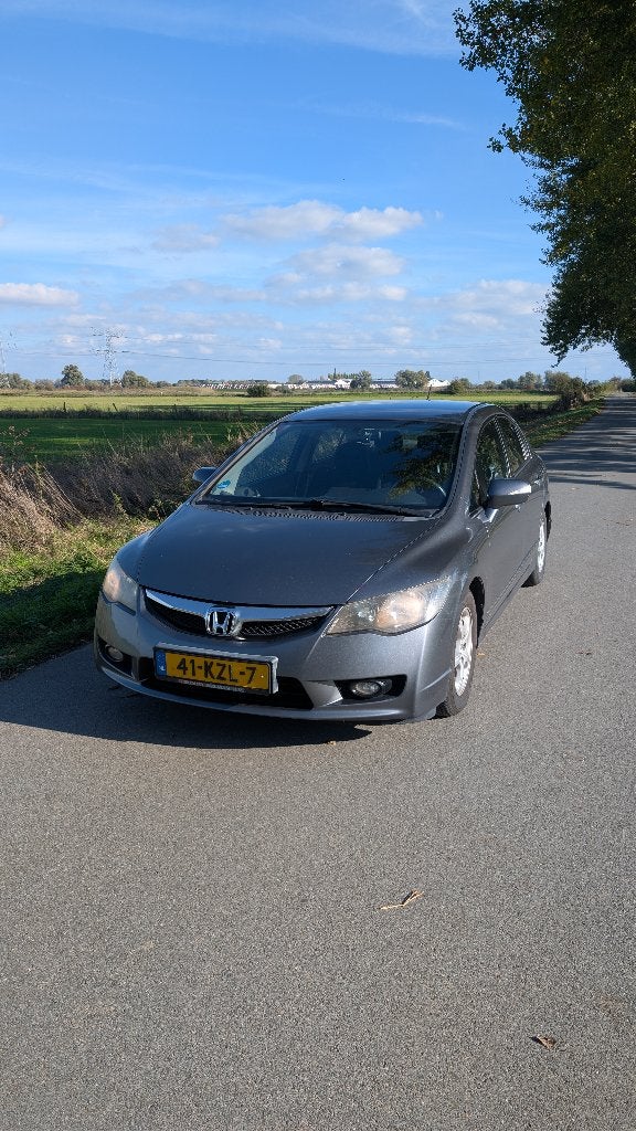 Honda Civic 1.3 Vtec Hybrid 4DR C-tr. 2010 Grijs, Auto's, Stof, 0 kg, Origineel Nederlands, Grijs