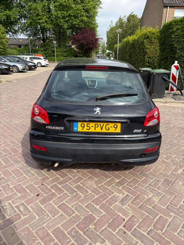 Peugeot 206+ 1.4 5D 2011 Zwart, Auto's, 206+, 4 cilinders, Zwart, Origineel Nederlands