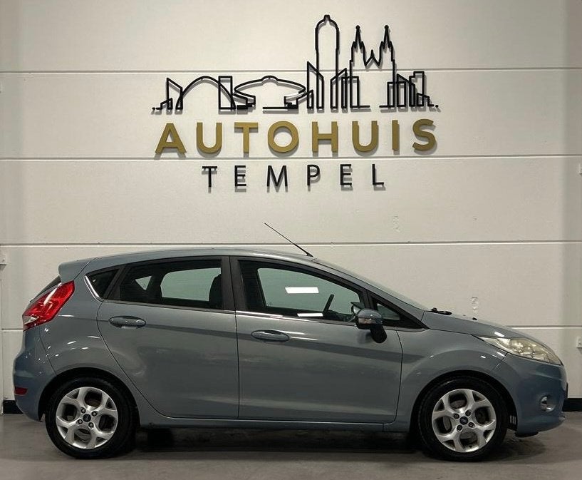 Ford Fiesta 1.25 Titanium Nap Airco Cruise Climate 5Deurs Tr, Voorwielaandrijving, Stof, 1242 cc, 82 pk