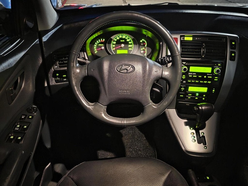 Hyundai Tucson 2.7i V6 4WD Style | Automaat | Leder | Trekha, Auto's, Automaat, Gebruikt, 2656 cc, Bedrijf