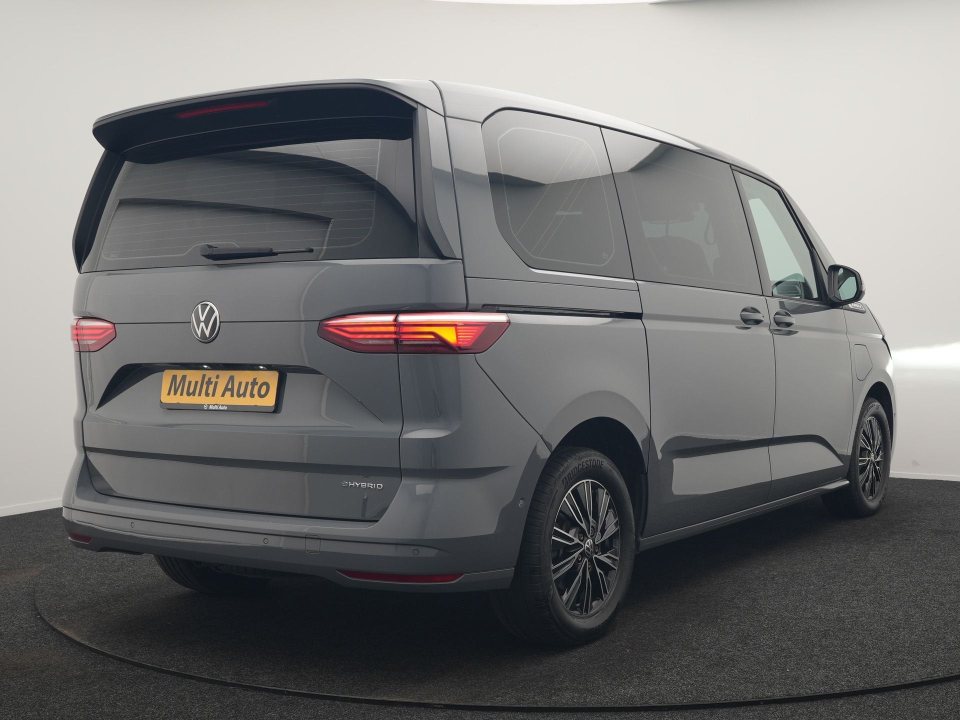 Volkswagen Multivan 1.4 eHybrid Bulli 7 Zits PHEV 218pk Deal, Auto's, Dealer onderhouden, Stof, Gebruikt, 4 cilinders