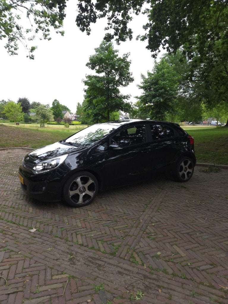 Kia Rio 1.2 I 5DRS 2013 Zwart, 4 cilinders, Zwart, Origineel Nederlands, Handgeschakeld