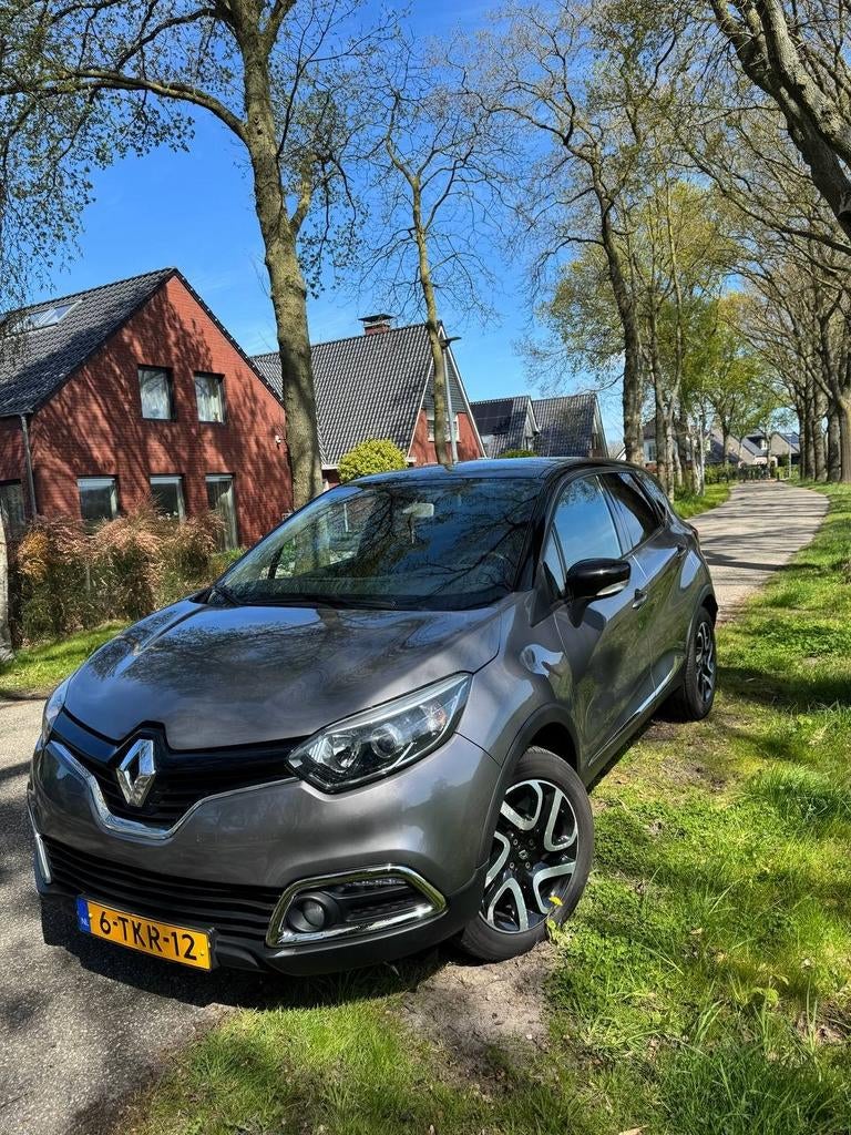 Renault Captur 0.9 TCE 90 2014 Grijs, Auto's, Voorwielaandrijving, 898 cc, 49 €/maand, Origineel Nederlands