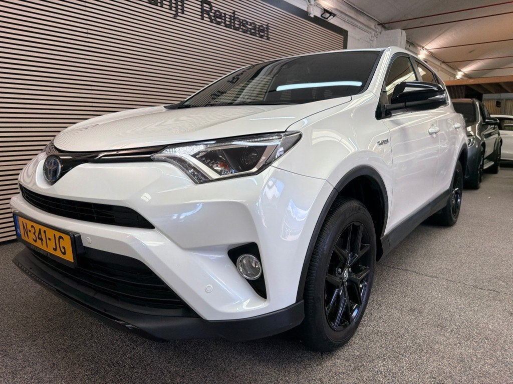 Toyota RAV4 2.5 Hybrid AWD Dynamic Panodak Acc Navi Trekhaak, Automaat, Gebruikt, 1650 kg, Wit
