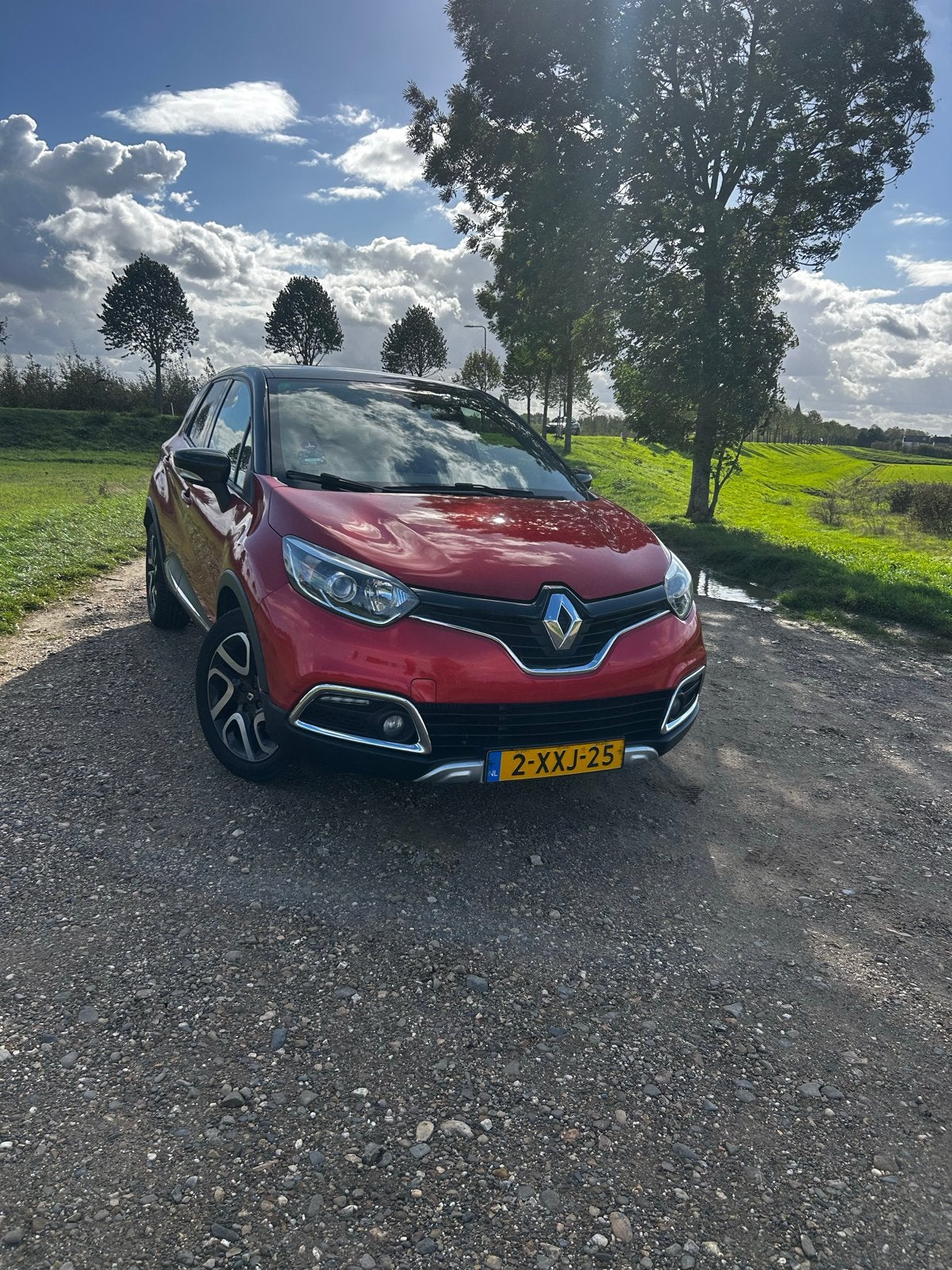 Renault Captur 0.9 TCE 90 2014 Rood, Auto's, Voorwielaandrijving, 898 cc, 49 €/maand, Origineel Nederlands