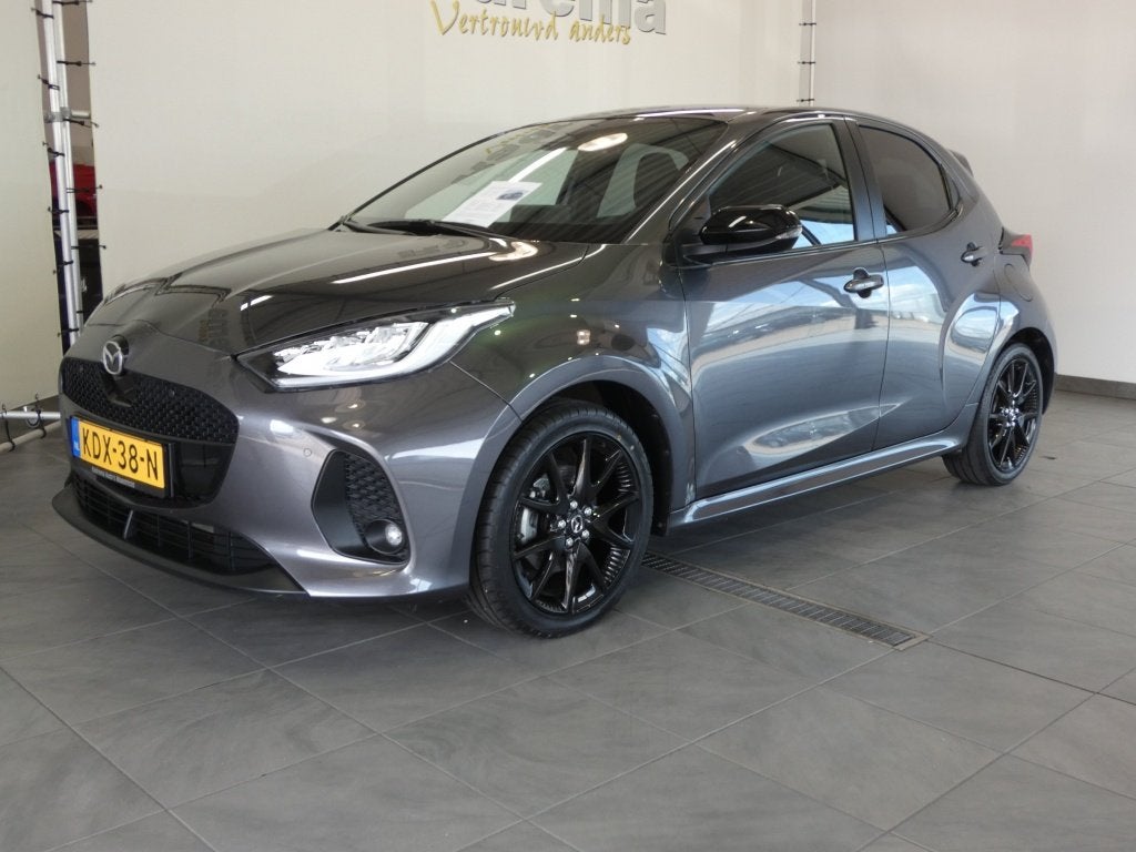 Mazda 2 Hybrid 1.5 Homura Plus (bj 2024, automaat), Auto's, Mazda, 450 kg, Gebruikt, Euro 6, 1210 kg