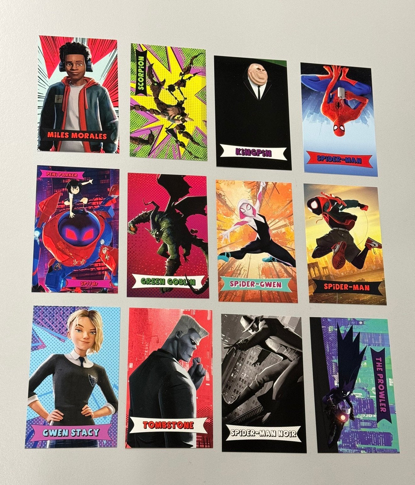 SPIDER-MAN INTO THE SPIDER-VERSE 12x verzamel kaart kaarten, Ophalen of Verzenden, Nieuw, Meerdere kaarten