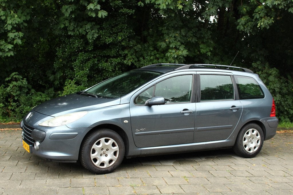 Peugeot 307 Break 1.6-16V Oxygo cuise en climate control Leu, Auto's, Peugeot, Stof, Gebruikt, Zwart, 4 cilinders