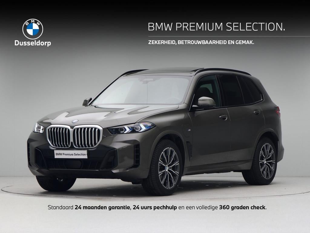 BMW X5 xDrive50e (bj 2025, automaat), Auto's, Metallic lak, Gebruikt, 2395 kg, Met garantie (alle)