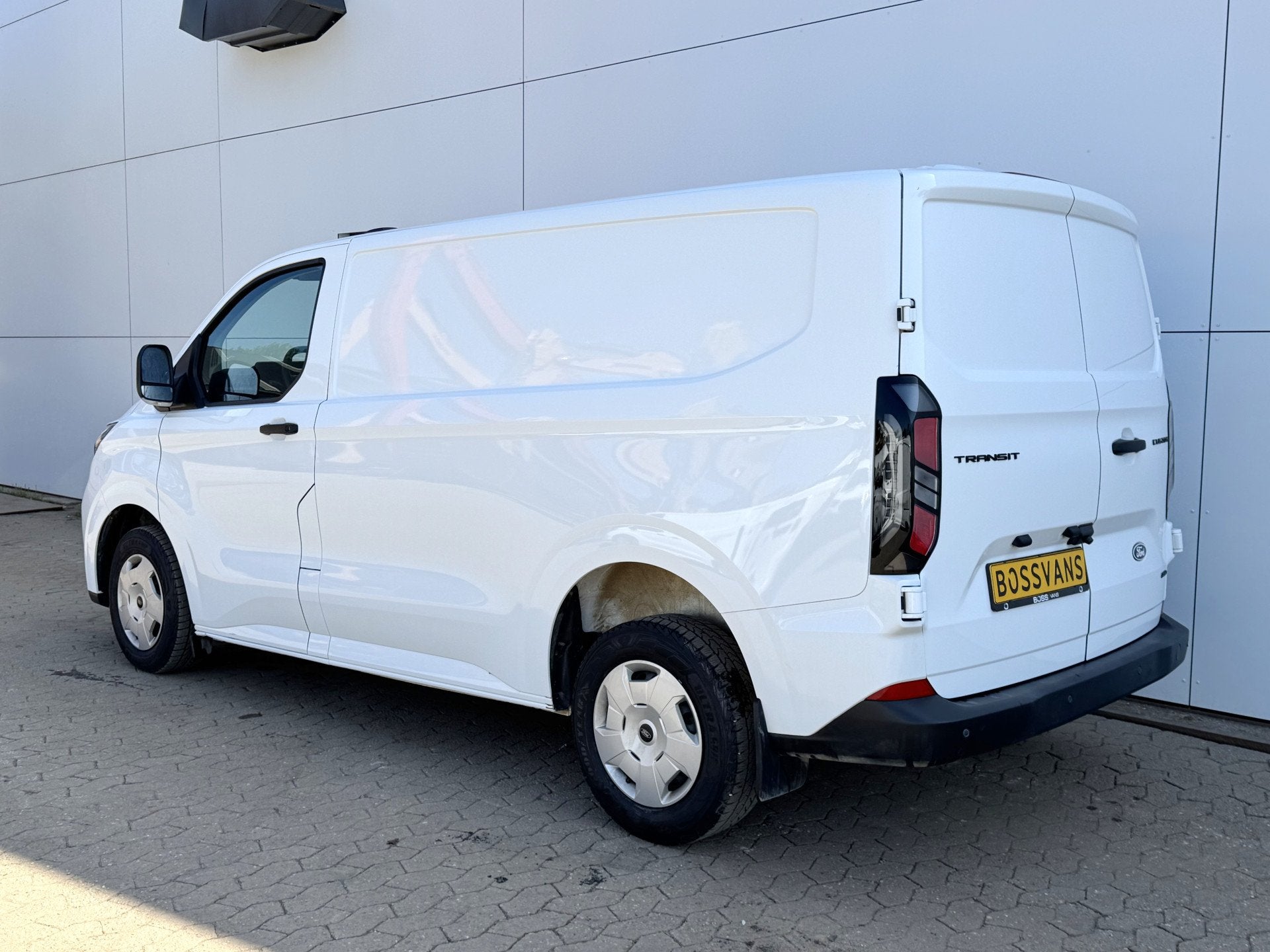 Ford Transit Custom 2.0 TDCI 140PK AWD Automaat L1 4x4 4WD L, Auto's, Bestelauto's, Automaat, Stof, Gebruikt, Zwart