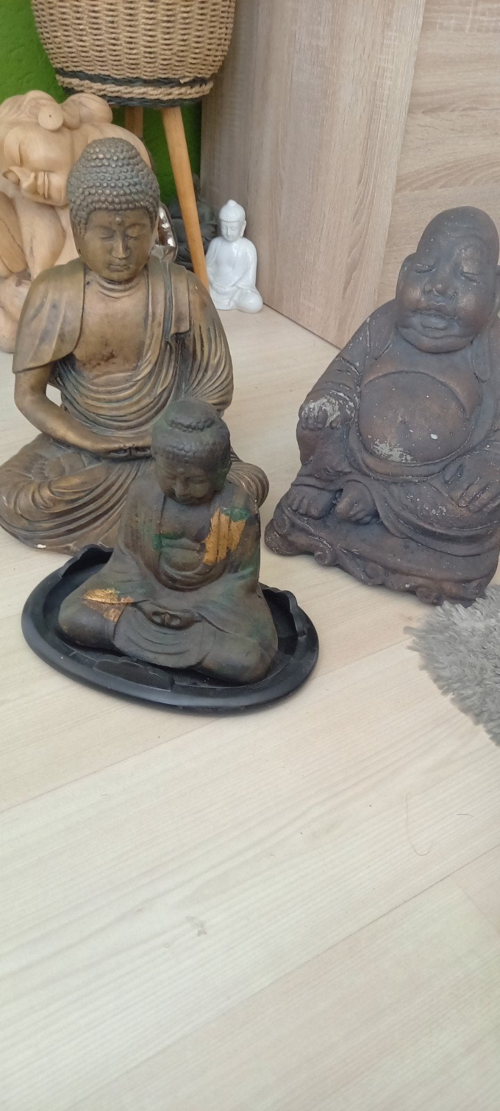 drie bronzen boeda beelden, Ophalen