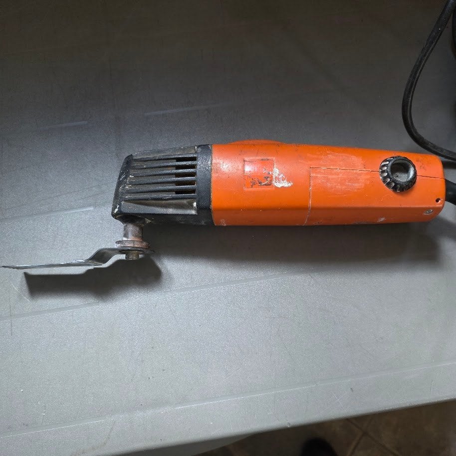 Fein Multitool - Oranje, Gebruikt maar Functioneel, Ophalen of Verzenden, Gebruikt, Multitool, Overige merken