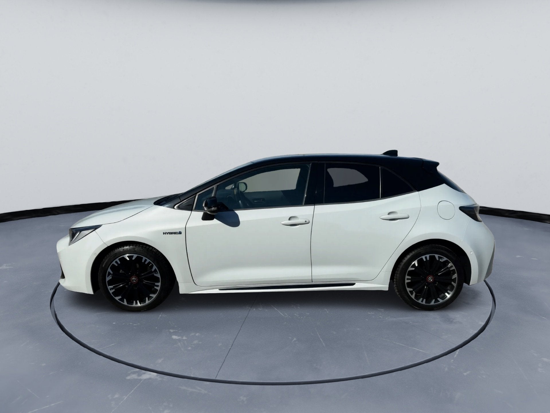 Toyota Corolla 1.8 Hybrid GR-Sport Half leder Achteruitrijca, Auto's, Toyota, Gebruikt, Zwart, 4 cilinders, 98 pk