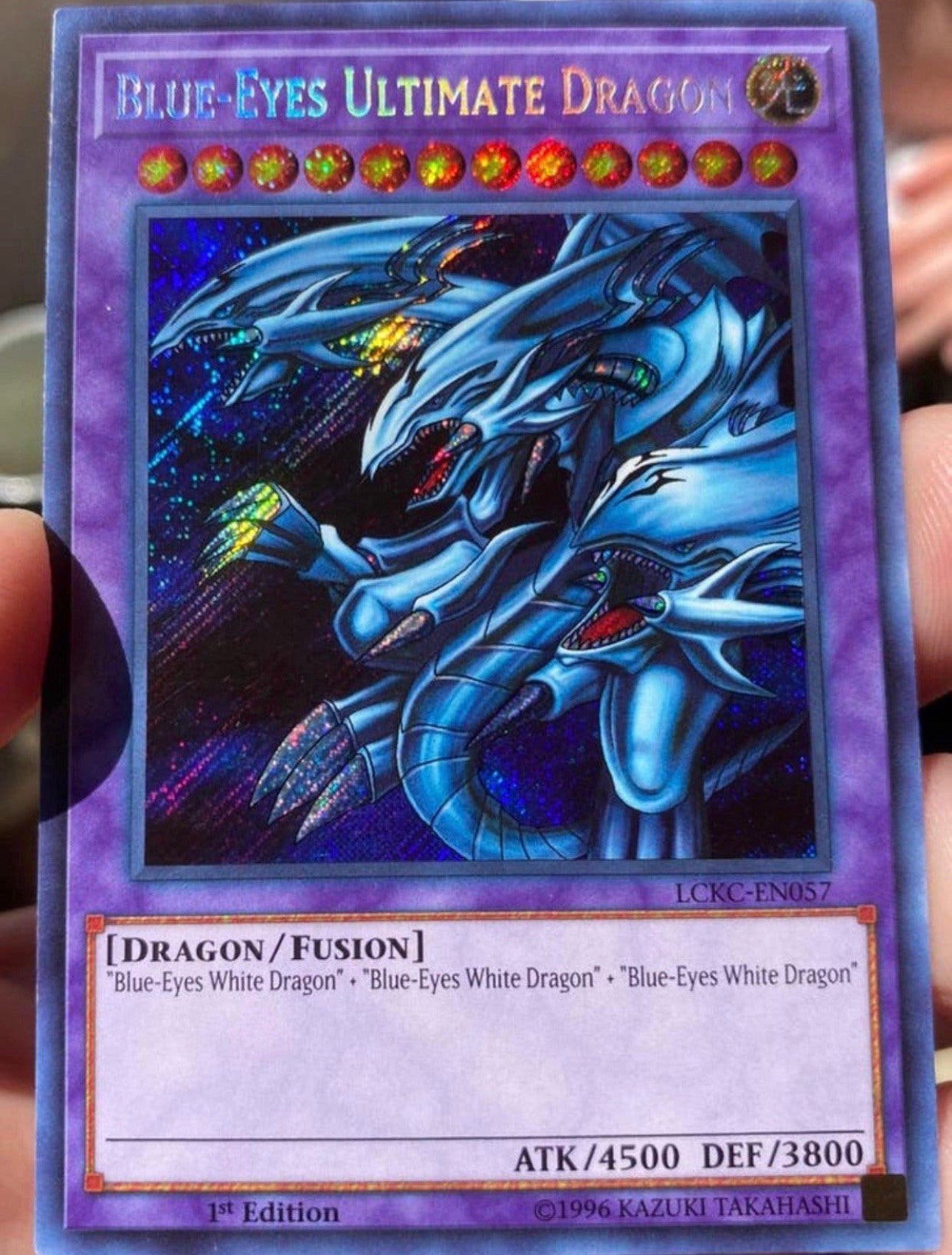 Yu-Gi-Oh! Blue-Eyes Ultimate Dragon LCKC 1st Edition !, Hobby en Vrije tijd, Ophalen of Verzenden, Zo goed als nieuw, Losse kaart