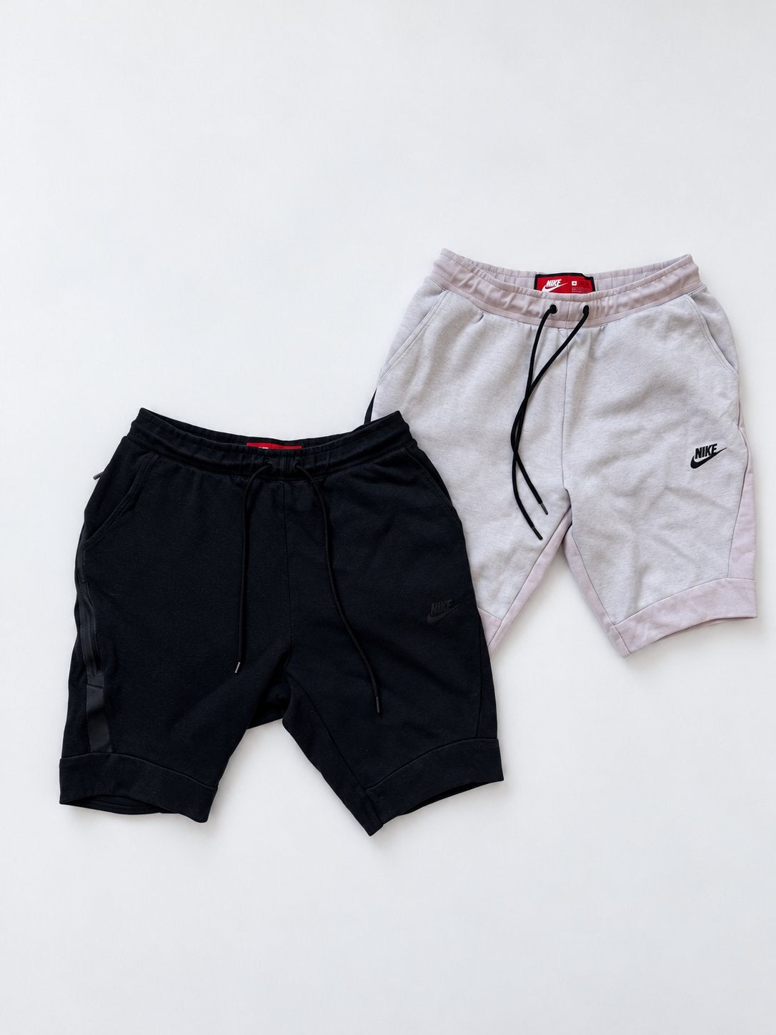 2x Nike Tech - Korte broekjes shorts zwart en roze - maat s, Ophalen of Verzenden, Zo goed als nieuw, Zwart