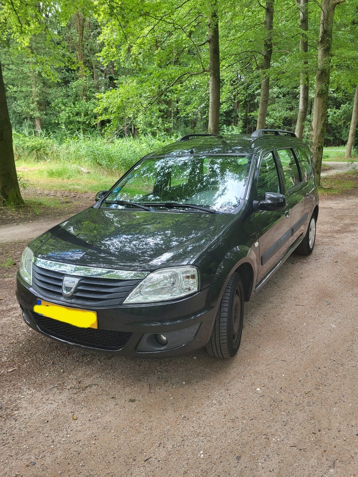 Dacia Logan 1.4 MCV 55KW 5P 2010 Zwart, Auto's, 74 pk, 4 cilinders, 620 kg, Origineel Nederlands