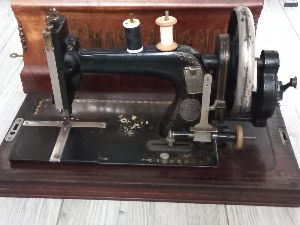 Winselmann naaimachine dubbelstiksteeknaaimachine., Ophalen