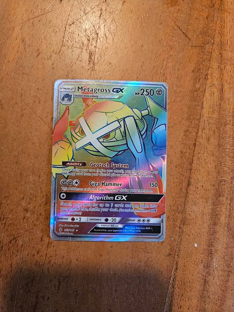 Pokémon Metagross GX Rainbow Rare (SM02 Guardians Rising), Ophalen of Verzenden, Zo goed als nieuw, Losse kaart, Foil