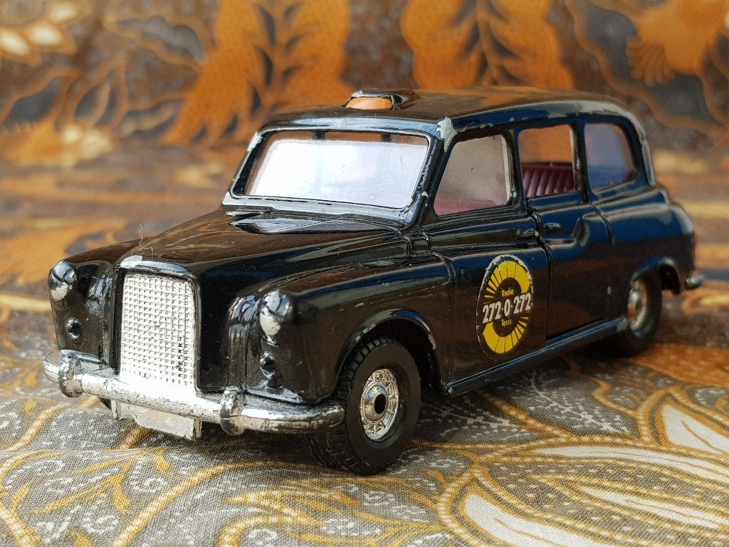 Mooie vintage model taxi van Corgi uit Engeland 12 cm., Antiek en Kunst, Antiek | Speelgoed, Ophalen of Verzenden